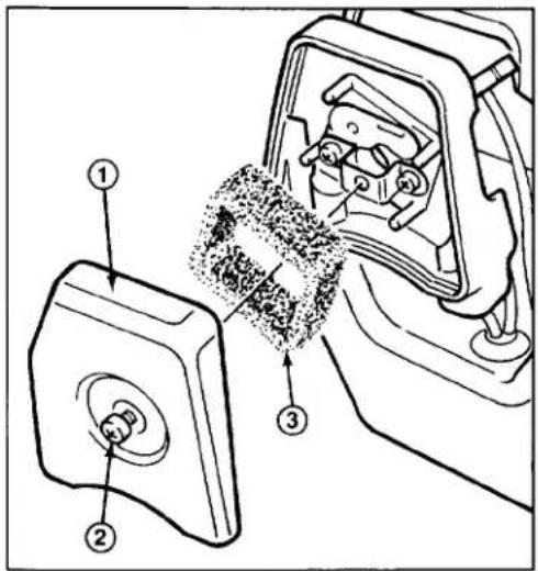 Technical diagram showing a mechanical assembly with labeled parts, including a component with pins and a textured internal structure.