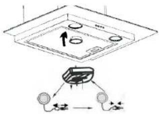 Diagram showing a ceiling-mounted device with directional arrows and labeled components, likely illustrating a mechanical or electrical system.