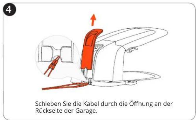 4 Schieben Sie die Kabel durch die Öffnung an der Rückseite der Garage.