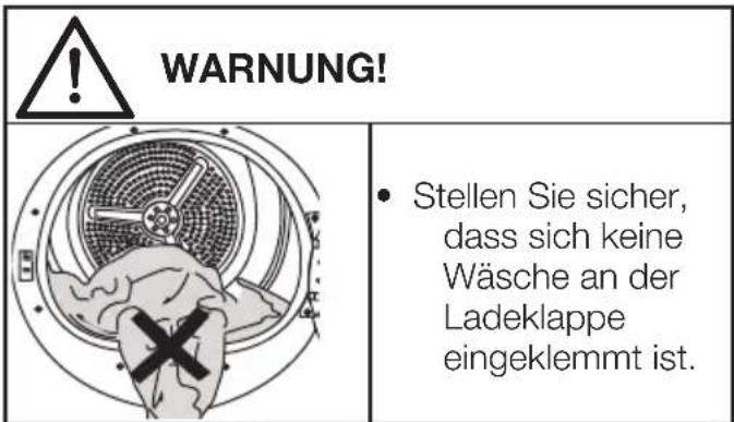 WARNUNG! Stellen Sie sicher, dass sich keine Wäsche an der Ladeklappe eingeklemmt ist.