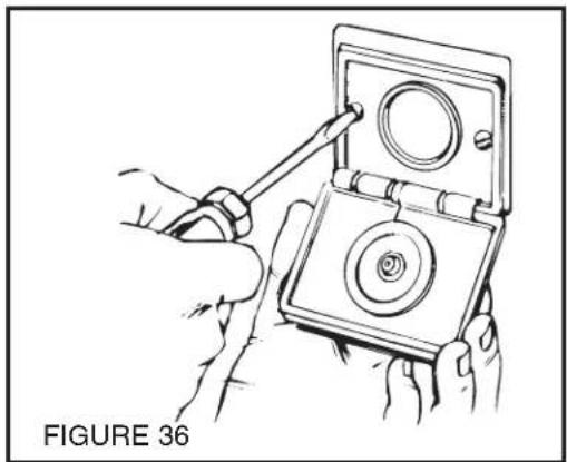 Line drawing of hands using a tool to adjust or install a device with a circular component (no text or symbols)