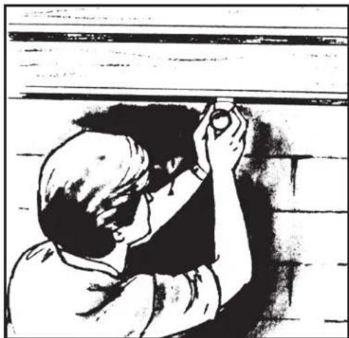 Black-and-white illustration of a person adjusting a wall-mounted device (no text or symbols visible)