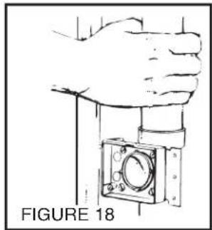 Line drawing of a hand pressing a mechanical component (no text or symbols)