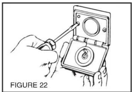Illustration of hands using a tool to adjust or install a device into a tray (no text or symbols visible)
