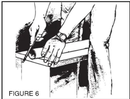 Illustration of hands using a tool on a mechanical component, labeled 'FIGURE 6' (no other text or symbols)