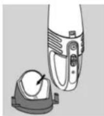 Illustration of a hand holding a small object with an arrow pointing to it, next to a circular object (no text or symbols present)