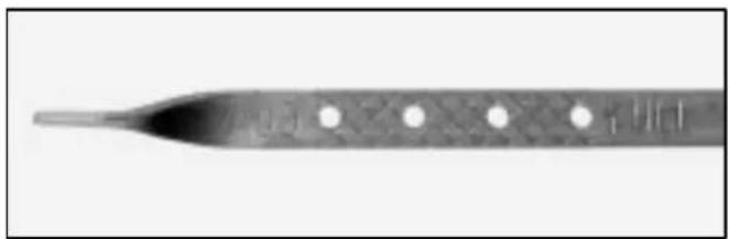 Close-up of a metallic tool tip with evenly spaced circular holes (no text or symbols visible)