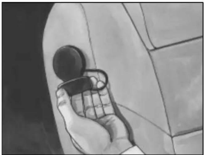 Black-and-white illustration of a hand holding a small object, possibly a mobile phone or scanner, against a tiled wall (no text or symbols visible)