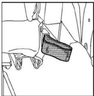 Line drawing of a hand holding a small object, possibly a seatbelt or grip, with no visible text or symbols.