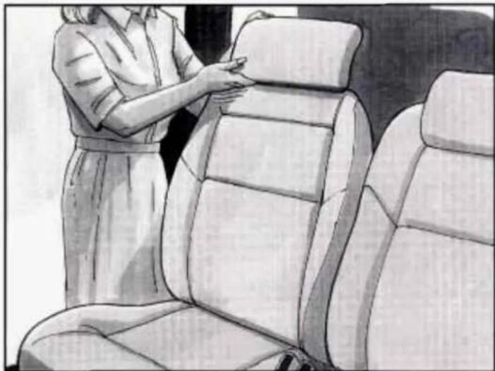 Illustration of a person adjusting a car seat, no text or symbols present