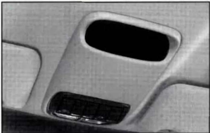 Close-up of a car's front air vent and side door panel (no text or symbols visible)