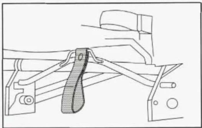 Technical line drawing of a mechanical assembly with a belt and bracket (no text or symbols)