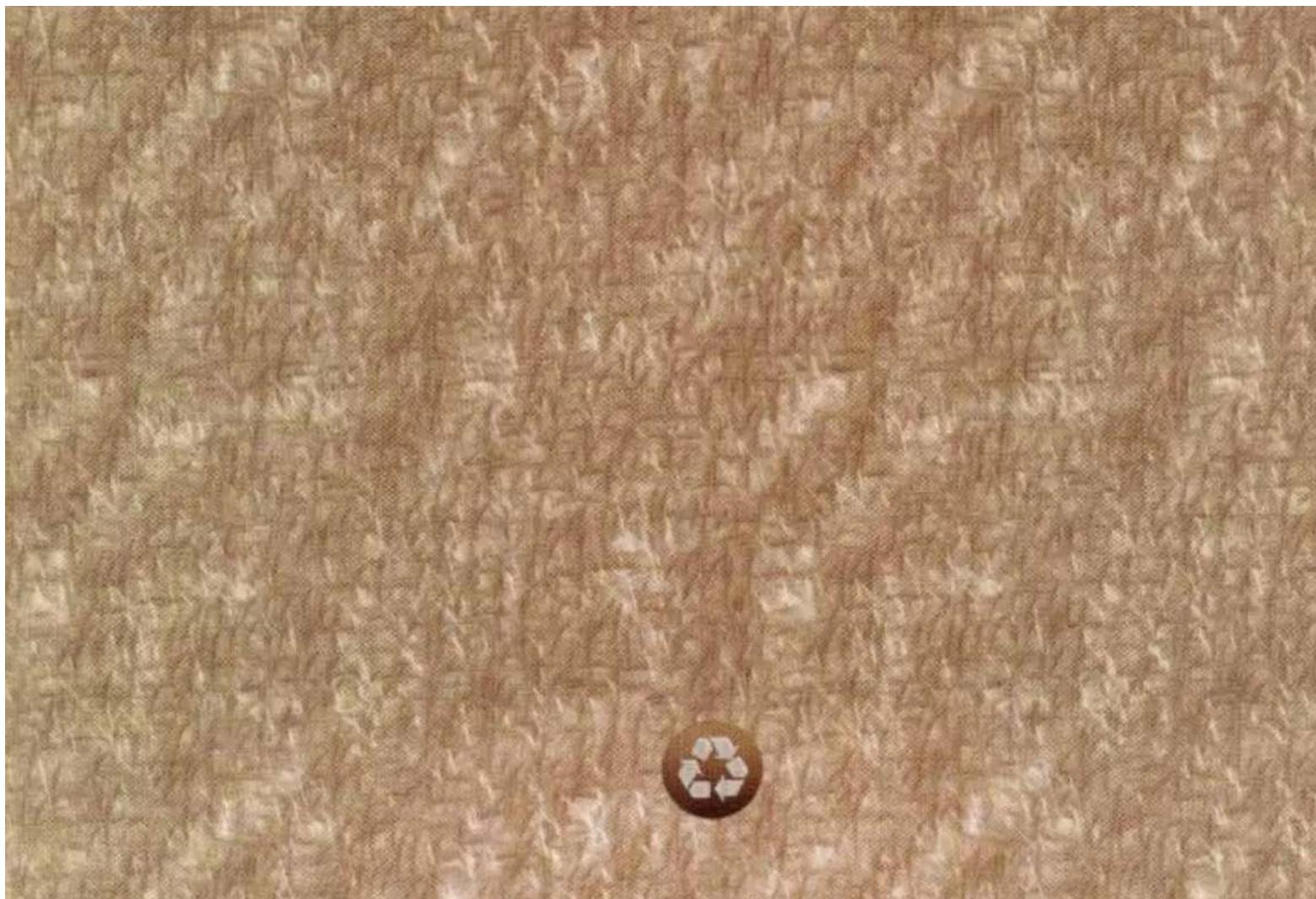 Close-up of a textured fabric surface with visible Chinese characters and a circular logo containing a white recycling symbol.