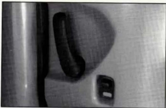 Close-up of a door handle and keyway mechanism (no visible text or symbols)