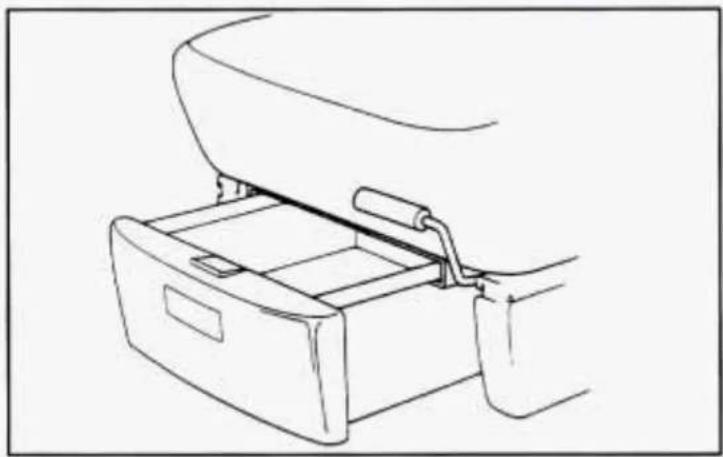 Line drawing of a car trunk drawer with handle and clasp (no text or symbols)