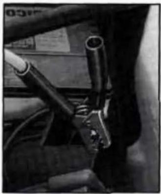 Close-up of mechanical components including hoses and connectors (no visible text or symbols)