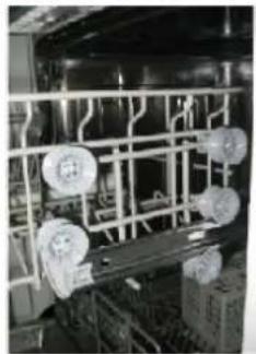 Industrial machinery setup with metal frame and circular components, no visible text or symbols.