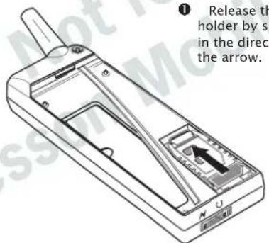 ① Release the holder by s in the direc the arrow.