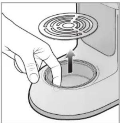 Illustration of a hand pressing down on a circular component with a circular vent, showing an upward arrow (no text or symbols)
