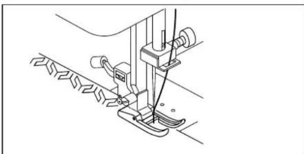 Technical line drawing of a sewing machine needle and foot (no text or symbols)