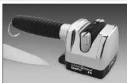 Close-up of a white and black handheld device with a knife handle (no visible text or symbols)
