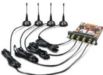 Electrical wiring and electronic circuit board setup with multiple antenna leads and coiled cables (no visible text or symbols)