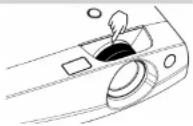Line drawing of a remote control with labeled buttons and dials