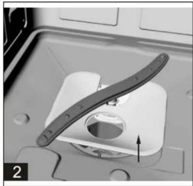 Close-up of a mechanical component with a curved blade and central hole, showing a directional arrow (no text or symbols)