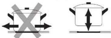 Diagram showing two cooking pots with crossed arrows indicating pressure or movement, likely illustrating a cooking or heating process.