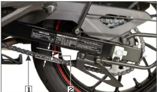Technical diagram of a motorcycle's front suspension system with labeled components and assembly details