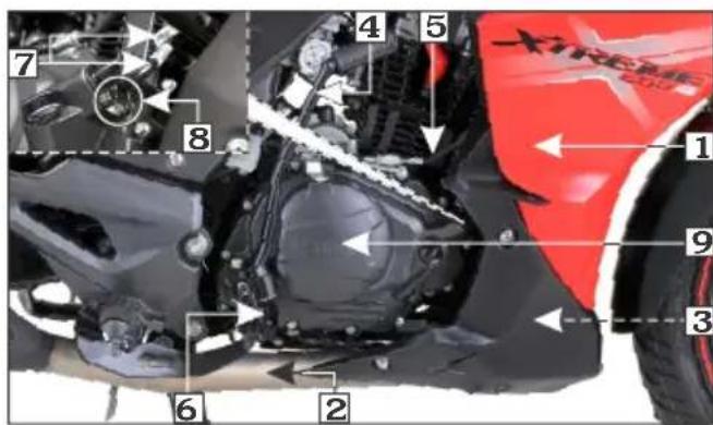Labeled mechanical assembly diagram showing numbered components of a motorcycle's engine and wheel assembly