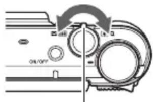 Technical diagram showing mechanical assembly with labeled parts and directional arrows indicating motion or movement