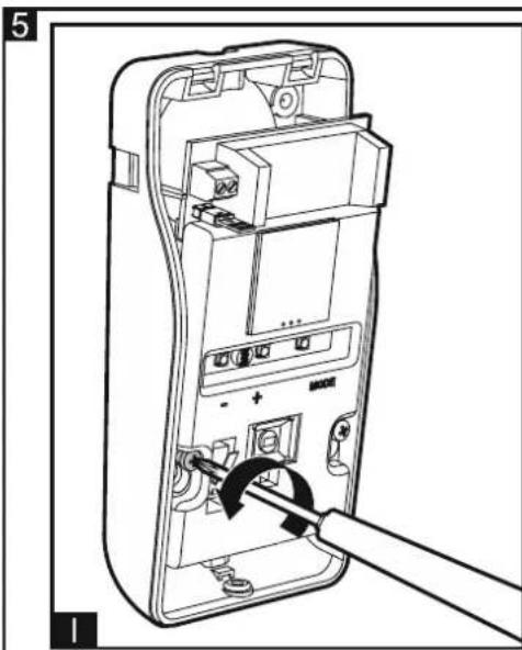 Line drawing of a device internal component with a screwdriver inserted, showing no text or symbols