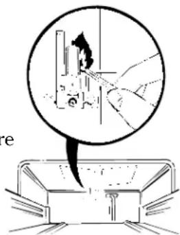 Diagram illustrating a mechanical or electrical process with labeled components and an inset showing a device with smoke or vapor.