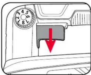 Diagram showing a device's dial indicator with a red downward arrow indicating a specific component or state.