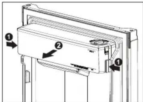 Technical diagram of a refrigerant unit with labeled components and directional arrows indicating assembly or movement.
