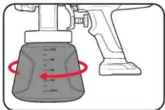Diagram showing a spray gun with a container labeled with dimensions and red arrows indicating measurement points.