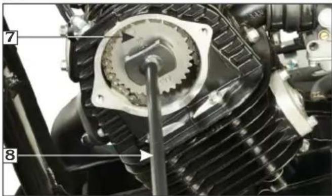 Close-up mechanical diagram of an electric motor with labeled parts 7 and 8, showing gear and shaft assembly.