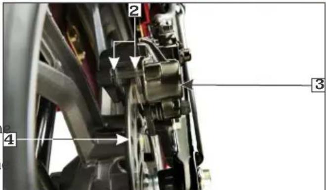 Technical diagram of a mechanical assembly with numbered components and directional arrows indicating motion or flow.