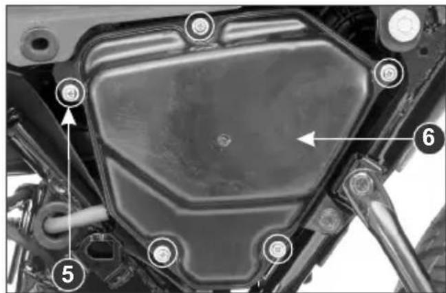 Technical diagram of a motorcycle's internal components with numbered labels pointing to specific parts