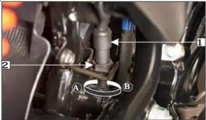 Technical diagram of a mechanical assembly with labeled parts A and B, showing components like a valve or actuator.