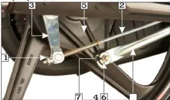 Labeled diagram of a car wheel assembly with numbered parts and mechanical components