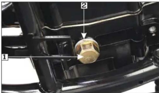 Close-up mechanical component with numbered callouts highlighting parts of a device or fixture
