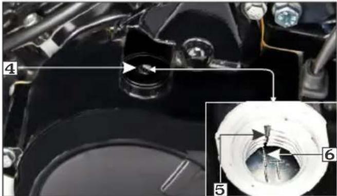 Technical diagram of a mechanical component with numbered parts and an inset close-up showing internal structure.