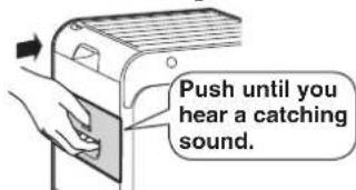 Push until you hear a catching sound.