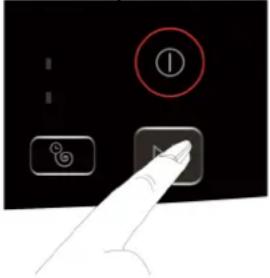 Hand pointing at a device control panel with icons including a numbered button and battery