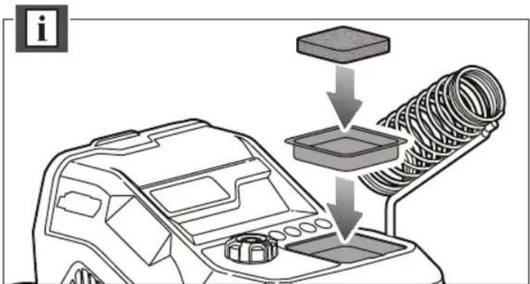 Diagram showing a device with a box being processed into a coil, with an information icon labeled 'i' in the corner.