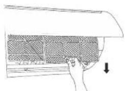 Hand placing a grid pattern into an air conditioner cover (no text or symbols visible)