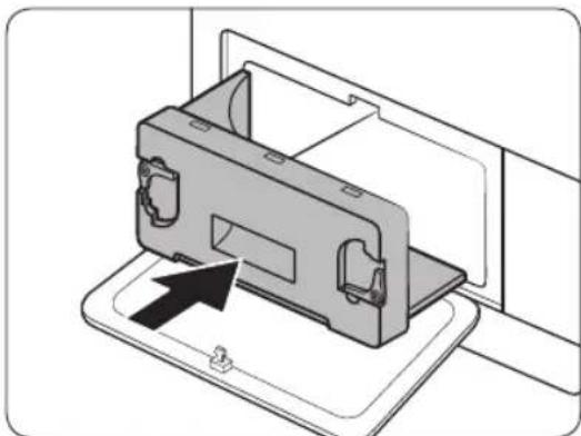 Diagram of a device being inserted into a tray, showing internal components and an arrow indicating insertion (no text or symbols present).