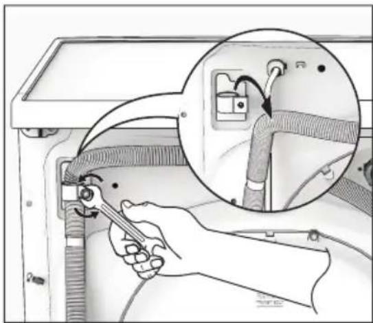 Illustration of a hand using a tool to adjust or install a component, with an inset showing a close-up of the pipe connection (no text or symbols present)